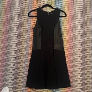 Club Monaco black dress with leather paneling. Size 6
